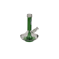 Läpinäkyvä Kani Ufo Bong 21cm, jossa näkyy diskusmainen UFO-perkolaattori ja lasinen yrttipesä. Piippu seisoo vakaalla, pyöreällä pohjalla, valmiina käyttöön.