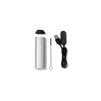 PAX Mini Vaporizer hopeanvärinen, kompakti ja valmis käyttöön, esillä yksinkertaisessa ja tyylikkäässä muotoilussa